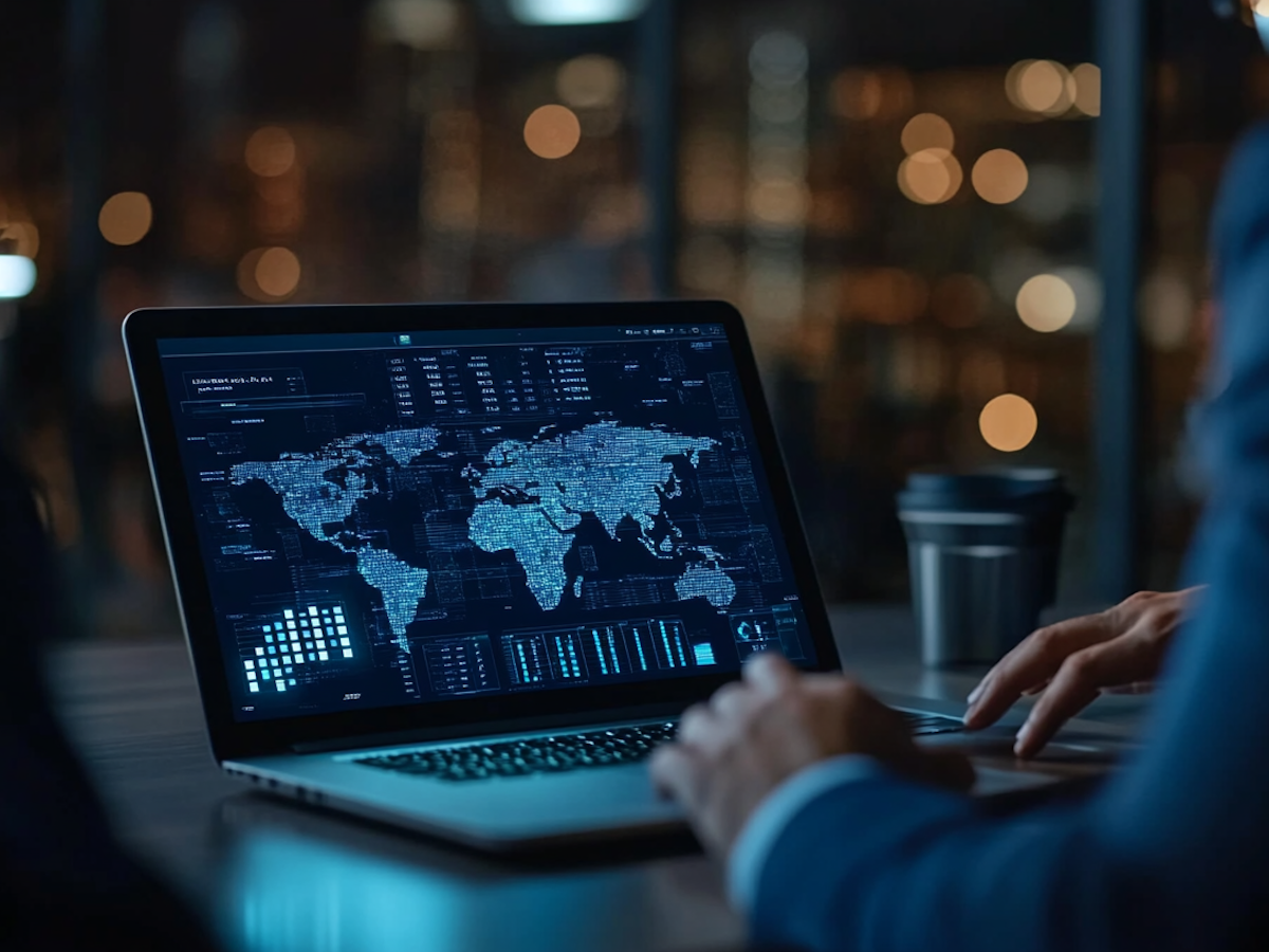 Analyst reviewing applicant data on screen